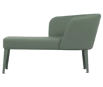 True Clara in left-side view, light sage green upholstery, wraparound backrest, and slim legs.