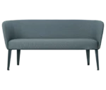 True Clara sofa shown from the front with dusty blue upholstery, a high curved backrest and slim legs.