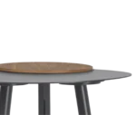 Close-up view of True Cloud side table, with a dark round tabletop and a removable wooden serving tray.