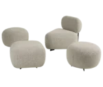 True Code modular seating with textured white upholstery and rounded forms in various shapes.