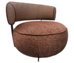 True Code lounge chair with textured rust upholstery, a rounded seat and curved patterned backrest.