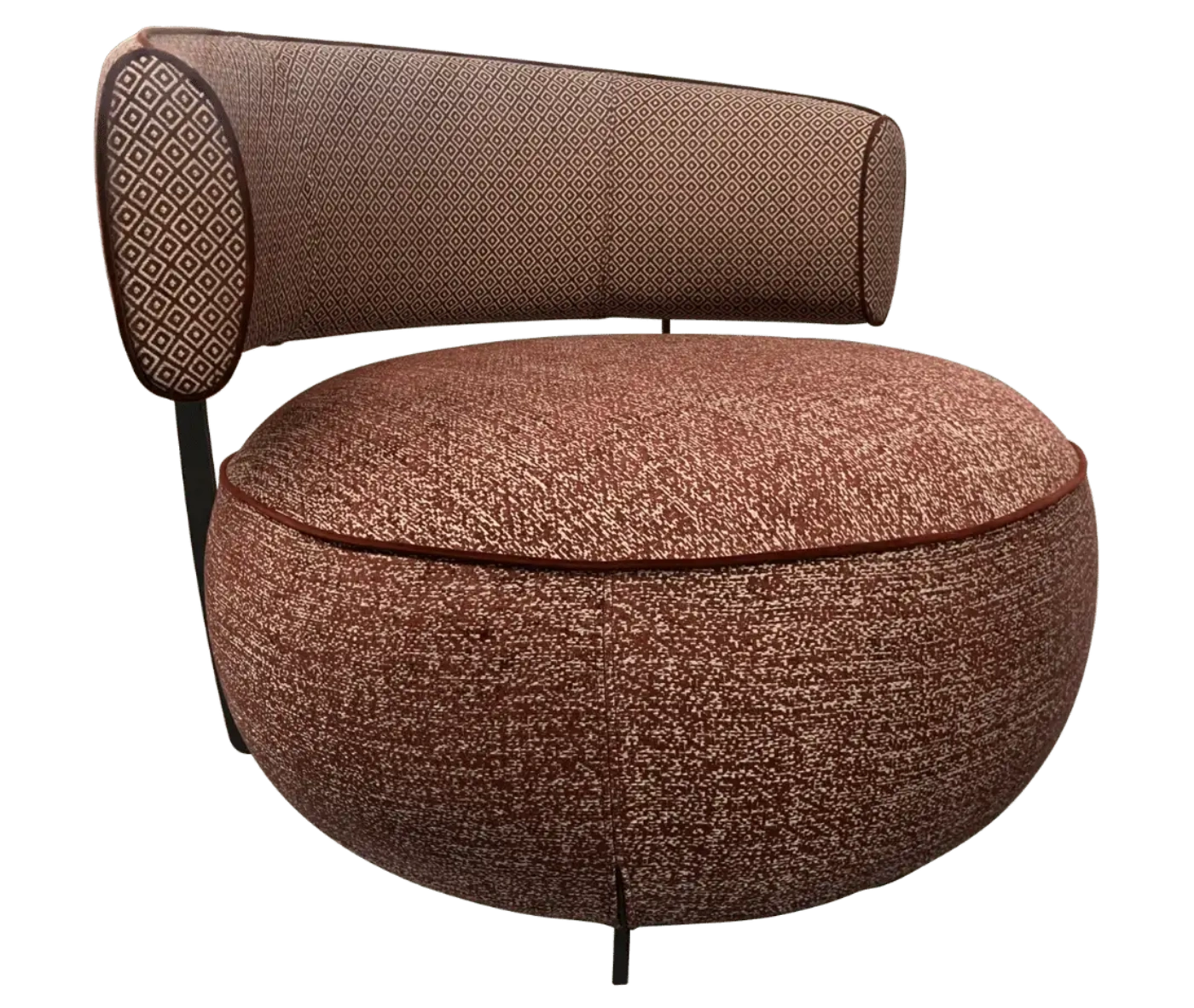 True Code lounge chair with textured rust upholstery, a rounded seat and curved patterned backrest.