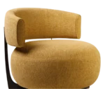 True Code lounge chair with mustard yellow upholstery, a rounded seat and curved backrest.