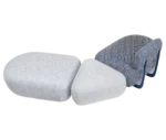 True Code modular seating system with patterned white and blue upholstery and a soft rounded form.