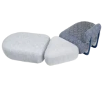 True Code modular seating system with patterned white and blue upholstery and a soft rounded form.