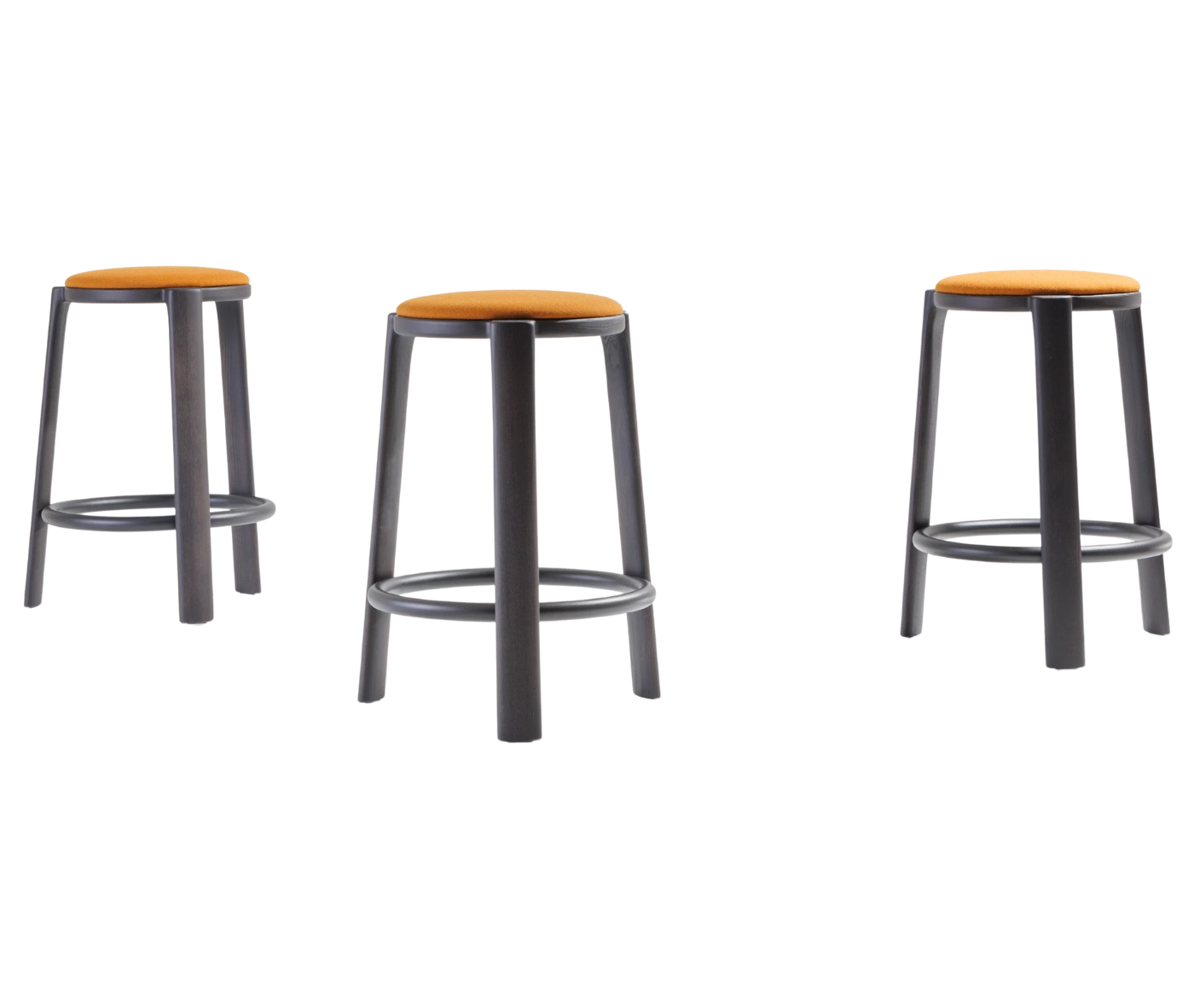 True Cute stools with orange upholstered seats, timber legs and circular footrests.