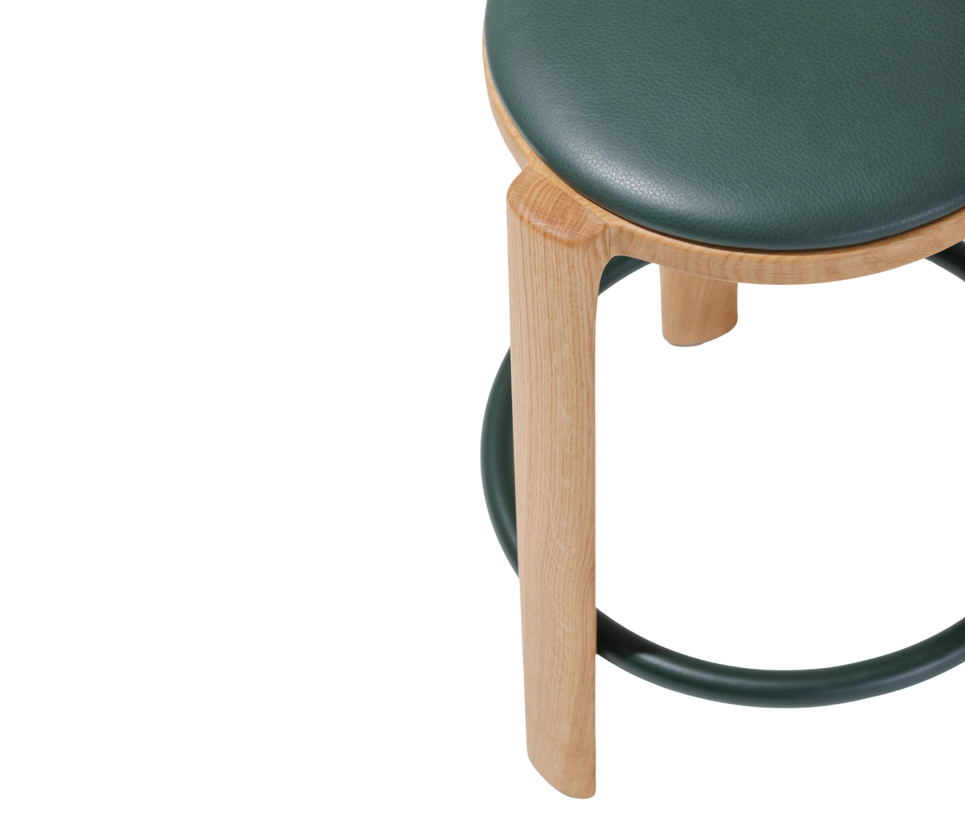 Close-up of True Cute stools in dark upholstered seats, timber legs, and circular footrests.