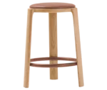 True Cute stool with a brown leather upholstered seat, timber legs and a circular footrest.