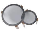 True Cute top view of two round occasional tables with smoked glass tabletops and solid timber frames.