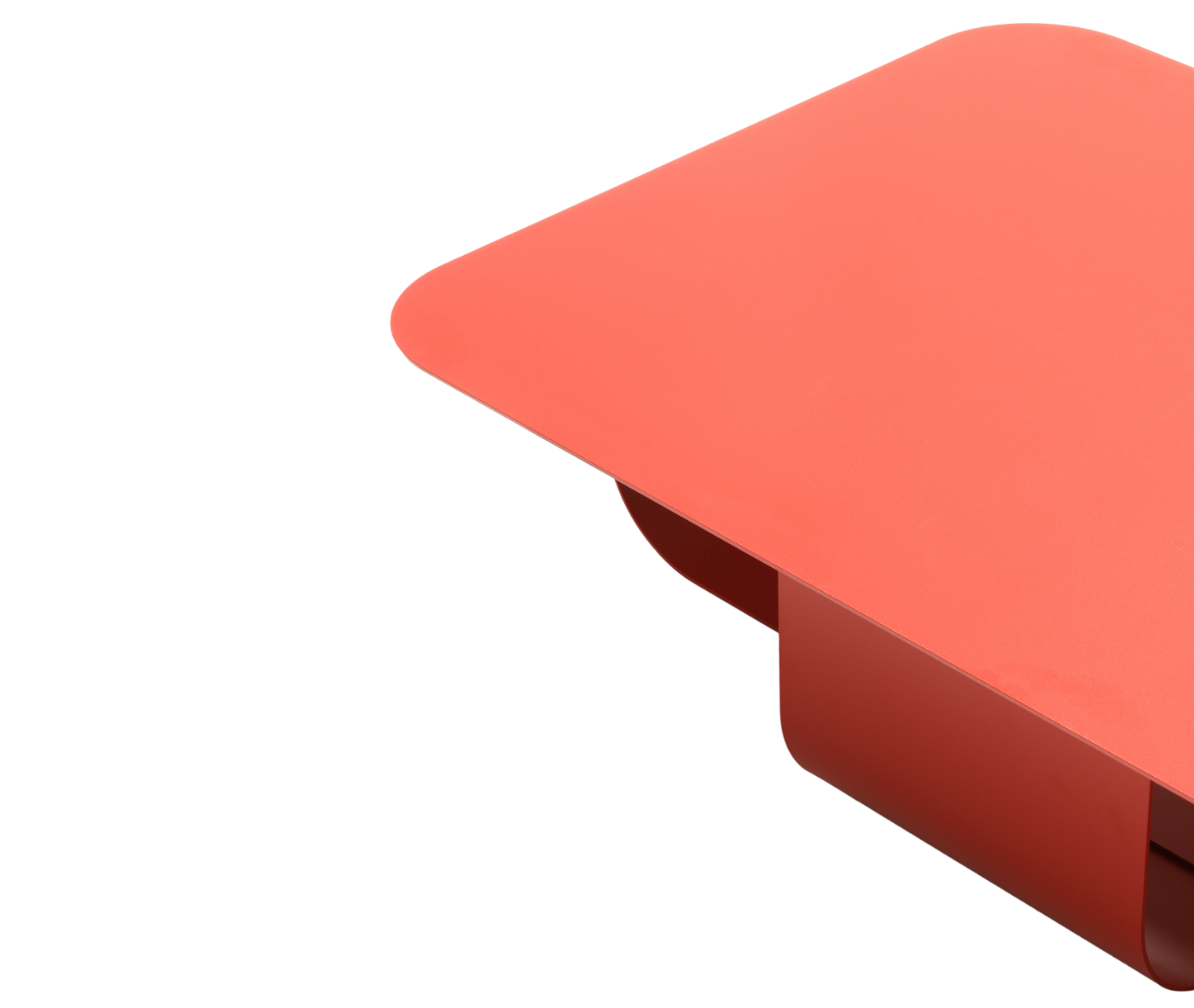 Detail of True Fiocco table with red rectangular top, rounded edges and metal base.