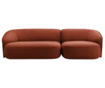 True Sibylla modular sofa shown in front view, terracotta red upholstery and curved backrest.