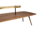 Half close-up of True Wing Library table with integrated brass reading lamp, timber top and timber legs.
