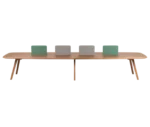 True Wing Working table in front view with dark timber top and frame, with divider screens in different colors.