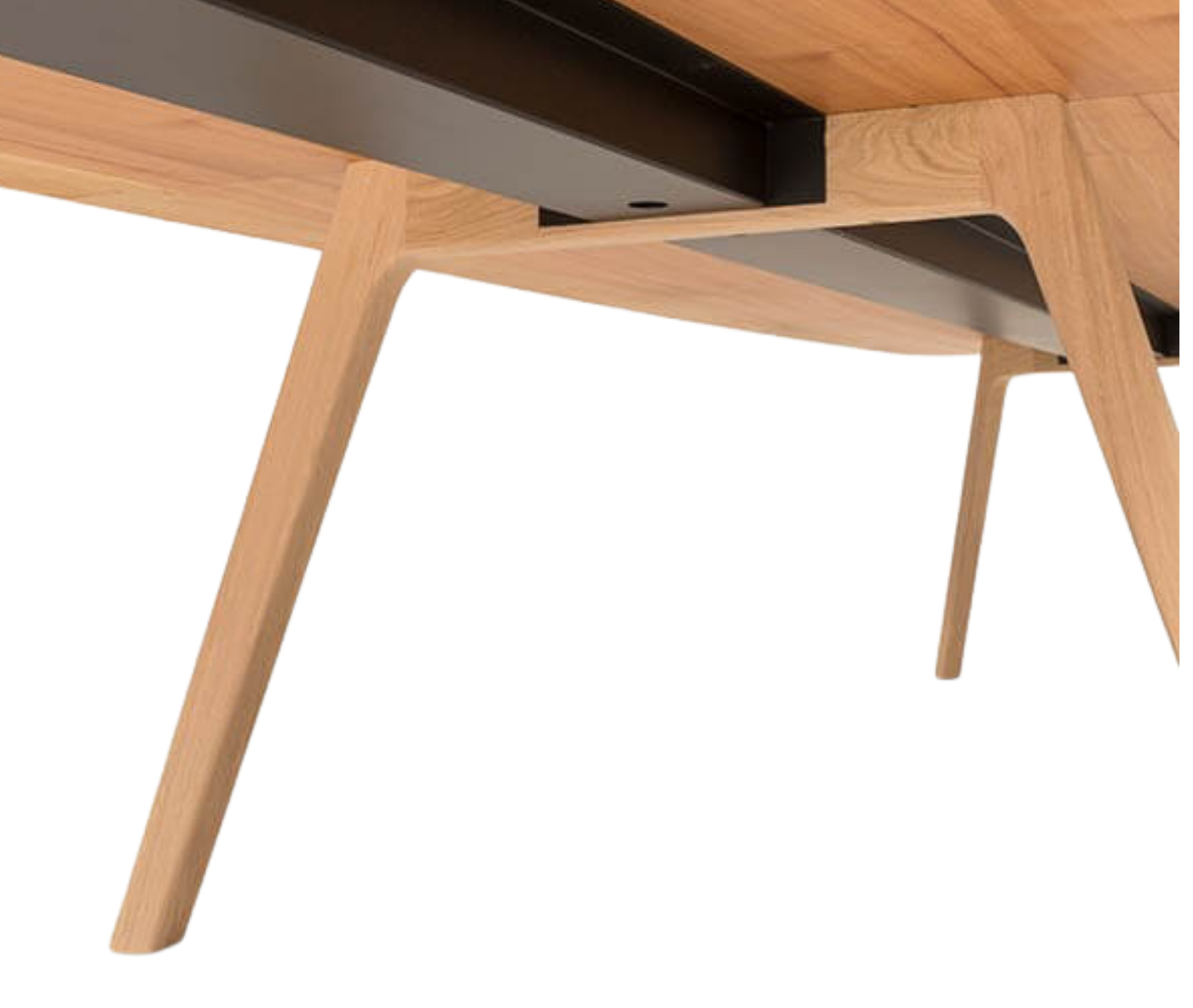 True Wing table with light timber legs and close-up detail of its steel beam designed for cable management.